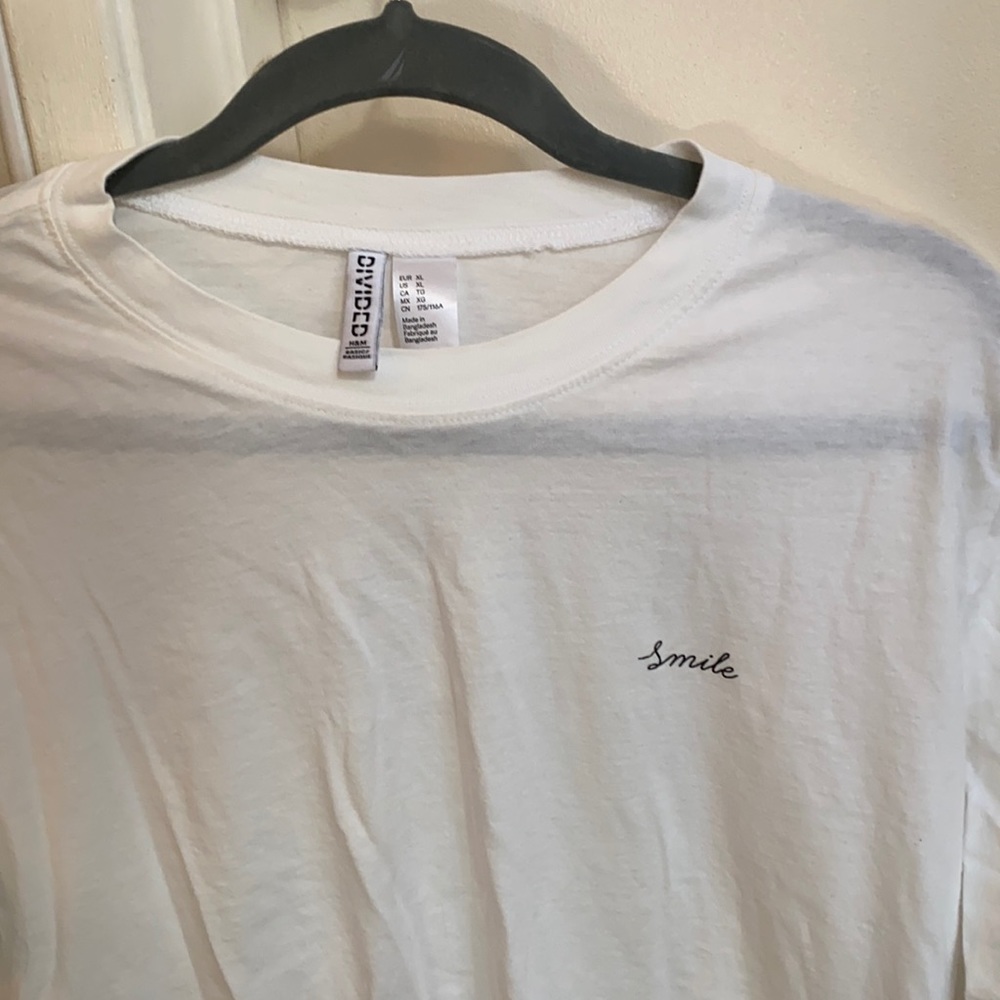 White crop top with “Smile” print